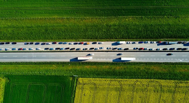 Image of a traffic jam on one side of a highway